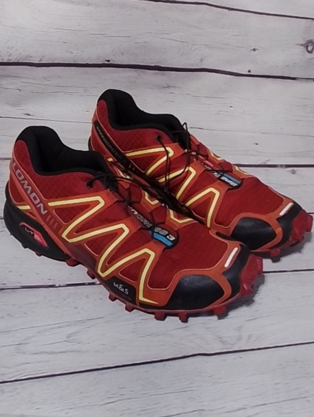 Salomon Men's Red Trail Running Shoes with Yellow Accents